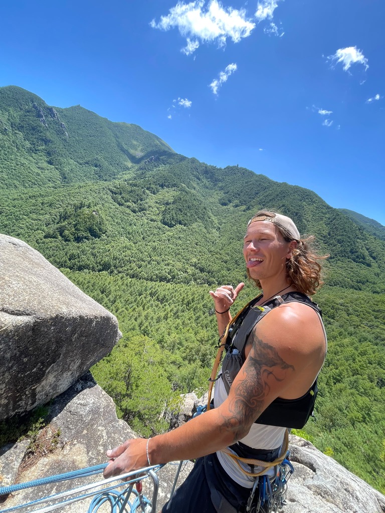 Troy rock climbing in the mountains